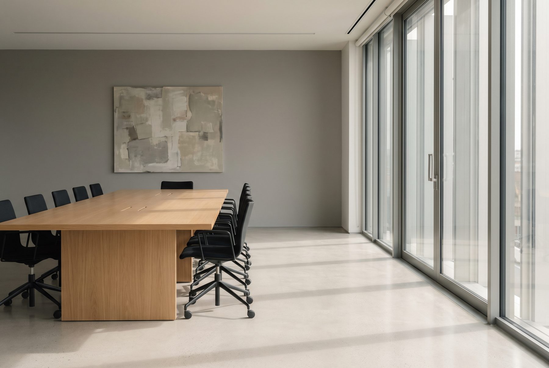 Interior of a GoDigi office with daylight across a long meeting table