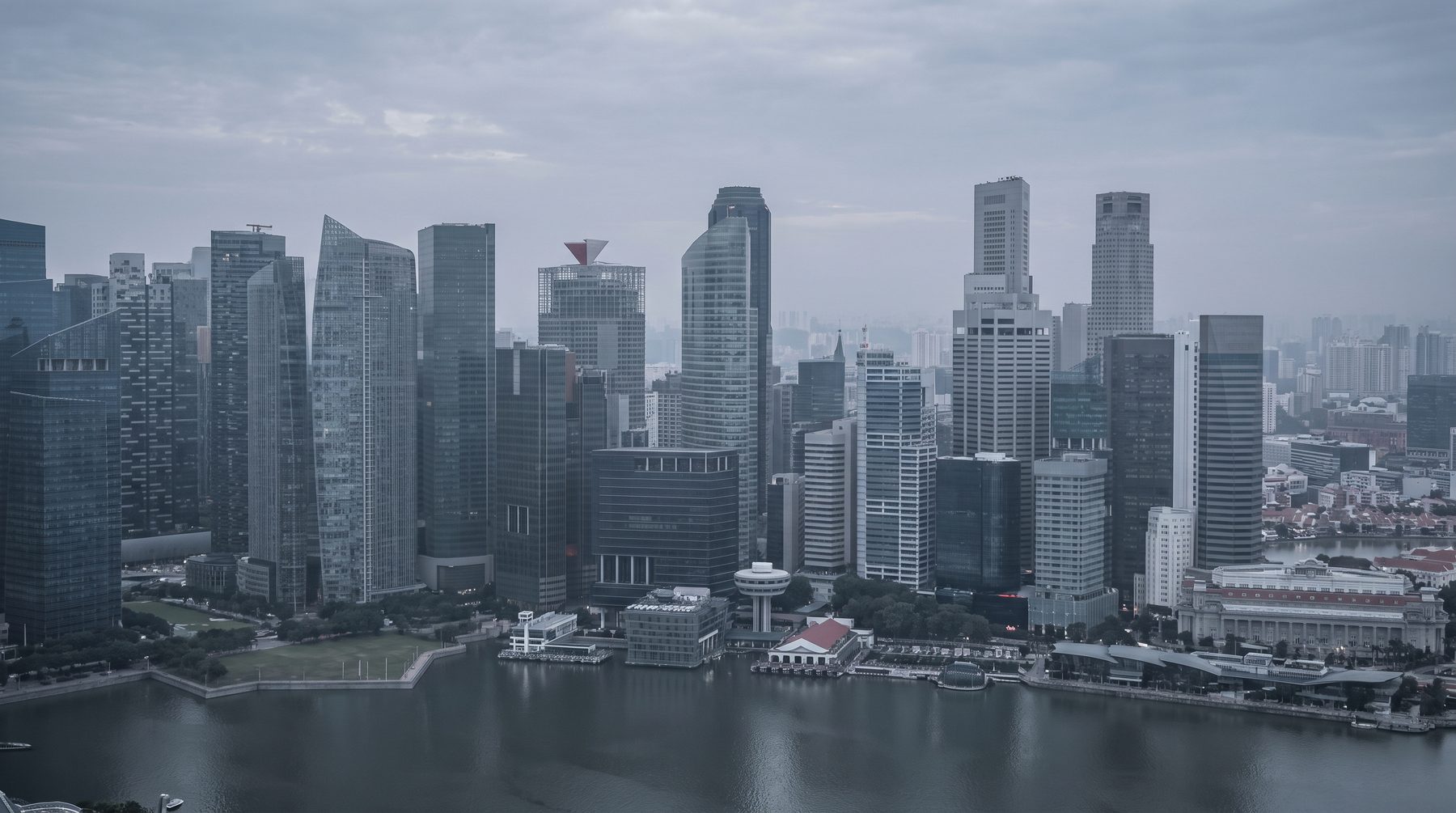 The Marina Bay financial district in Singapore at dusk